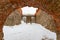 Stone walls of historical Trakai castle covered with snow, Lithuania. Winter landscape