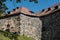 Stone walls and orange roof tiles from Akershus Castle in Oslo