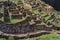 Stone walls ruins and old houses in Machu Picchu