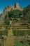 Stone walls and tower of Castle over hill near garden at Marvao