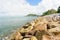 Stone wave barrier near beach.