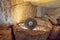 Stone wheel in a cave illuminated by counter light