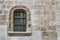 Stone window of Gothic architecture in the convent church of San Pablo in Valladolid