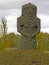 A stone woman on a hill.