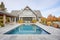stonebordered pool by shingle style residence