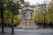 Stoned fountain on cozy place in chatelet quarter