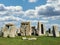 Stonehenge in Bright Day with Dramatic Clouds Behind It