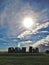 Stonehenge in the sunshine with clouds