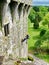 Stonemason repairs walls of Blarney Castle a medieval castle near Cork, Ireland