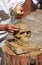 Stonemason working on a sandstone skull