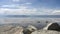 Stones on background calm water of Lake Hubsugul.