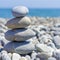 Stones balance, pebbles stack over blue sea. Beauty world