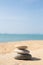 Stones balance, pebbles stack on sunny sea beach