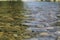 Stones at the bottom of a transparent river