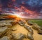 Stones desert on sunset background