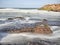 Stones entering the sea with a silk-like appearance