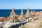 Stones Piled on Each Other near Coastline: Rocks and Cliffs near Sea