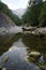 Stones reflected in the stream