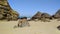 Stones and rocks on sandy beach in Portugal the west Atlantic ocean
