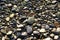 Stones on the seashore, pebbles on the beach, background.