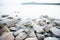 Stones on Shore in La Colba Bay on North Sardinia, Italy. Beach of Rena di Ponente