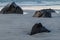 Stones on the snowy beach, long exposure at Lofoten islands, Norway.