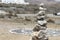 Stones stacked balanced in the sand on the beach, Buddhism mode