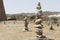 Stones stacked balanced in the sand on the beach, Buddhism mode