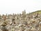 Stones stacked one on the other. Instalation near the Memorial naval aviation Cape of the Goat, France