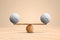 Stones Wooden scale on wood floor and brown background. Wood balance with 3d sphere stone marble texture. Ideal balance concept