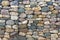 Stonework shore strengthening. Close-up. Abstract background. stones in iron nets protect the beach and the shore from wave