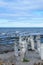 Stonework statues leading into the St. Laurence River