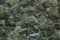 Stonework texture. Green grey stone wall background. Masonry of decorative tile. Abstract pattern of gray rocks wall. Texture of o