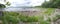 Stoney beach with trees at  Kejimkujik