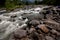 Stonny shallow river with fresh and clear water