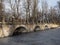 Stony bridge in baths park in European Warsaw city of Poland