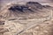 Stony desert landscapes with paved road, Sahara.