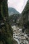 Stony river bed with steep cliffs on each side in Taroko National Park