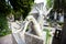 Stony sculpture hands on Vlasta Burian grave in Vysehrad cemetery in Prague, Czech Republic