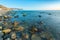 Stony sea beach of the 40th anniversary of the victory of the high coast of Anapa at sunset, Black Sea, Anapa, Russia