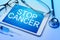 Stop Cancer word on tablet screen.