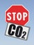 Stop Co2 written on roadsign - concept image on blue background