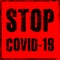 Stop Covid-19 black text on a red background