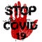 Stop Covid-19 Coronavirus concept, red grunge sign with hand