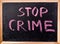 Stop crime word on blackboard