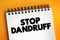 Stop Dandruff text on notepad, medical concept background