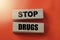 Stop drugs words on wooden blocks. Stop abuse healthcare concept