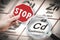 Stop heavy metals - Concept image with hand holding a stop sign against a cadmium chemical element with the Mendeleev periodic