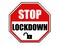 Stop the lockdown, text written on a road traffic sign.