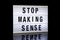 Stop making sense, phrase written on lightbox